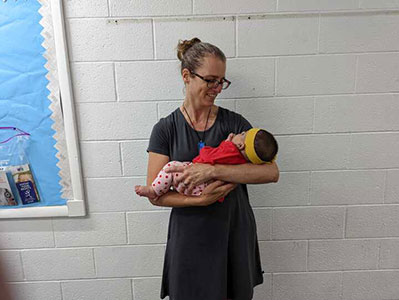 woman holding baby